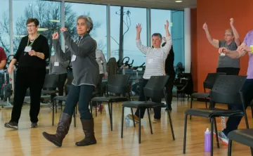 senior women dancing for health