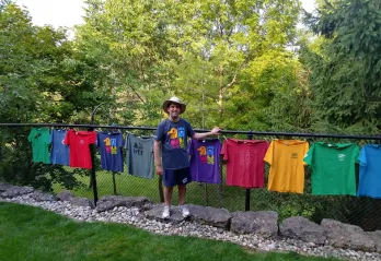 Matt Fox with his Wanakita staff and camp shirts