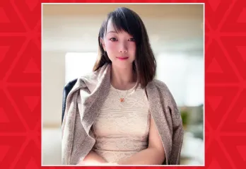 Young women with slight smile in office chair