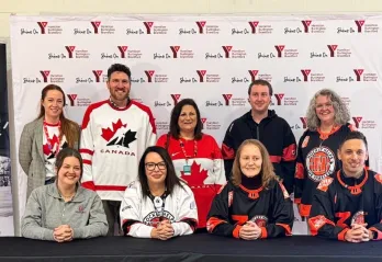 Front: Emma Langlois from Hockey Helps the Homeless, Genevieve Hladysh VP Health Fitness, Aquatics and Men's Residence, Geraldine Heaney, Olympian, and 