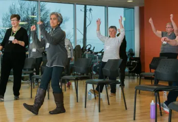 senior women dancing for health