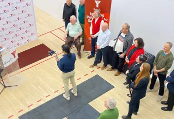 handball court dedication wide shot