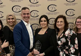 Group of people with glass award