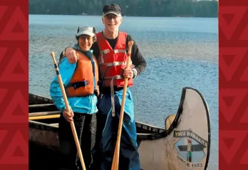 john_and_anne_marie_wilson_-_work_weekend_volunteers_paddle_voyageur_canoe