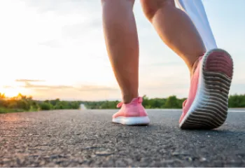Woman walking down road