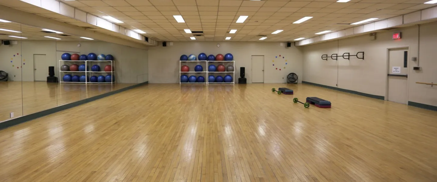 Fitness Studio with mirrors and equipment