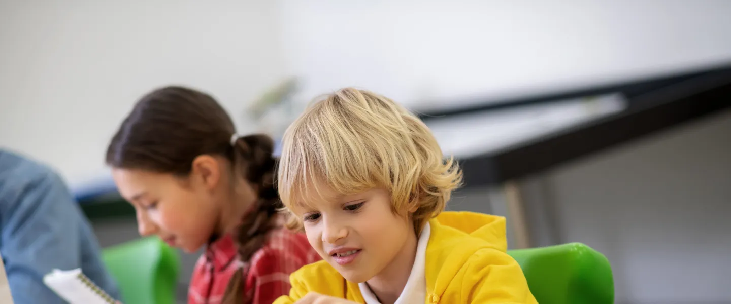 Male child building a toy structure