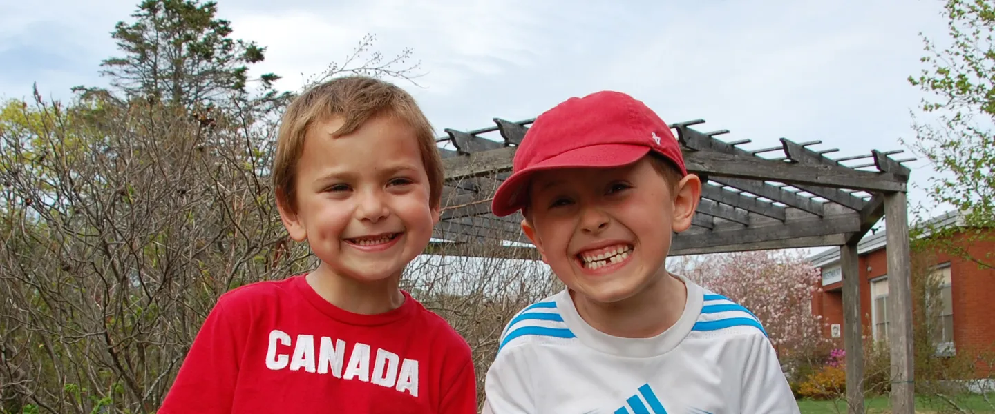 Boys smiling into camera