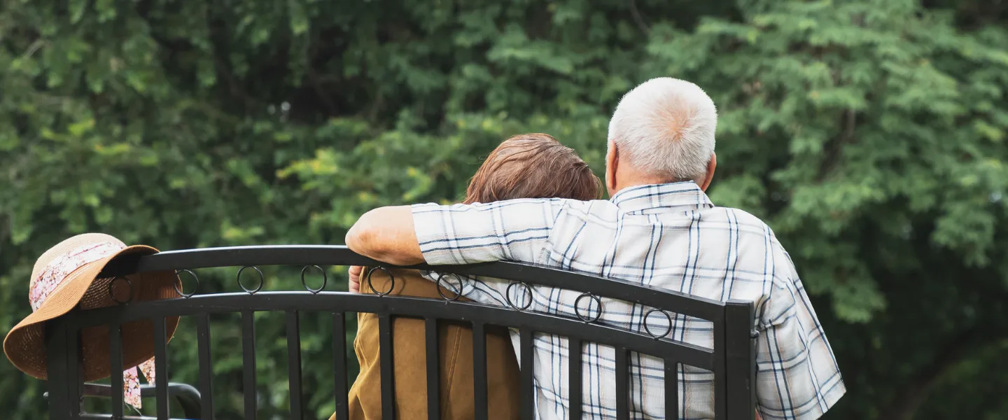 Elderly couple on bench