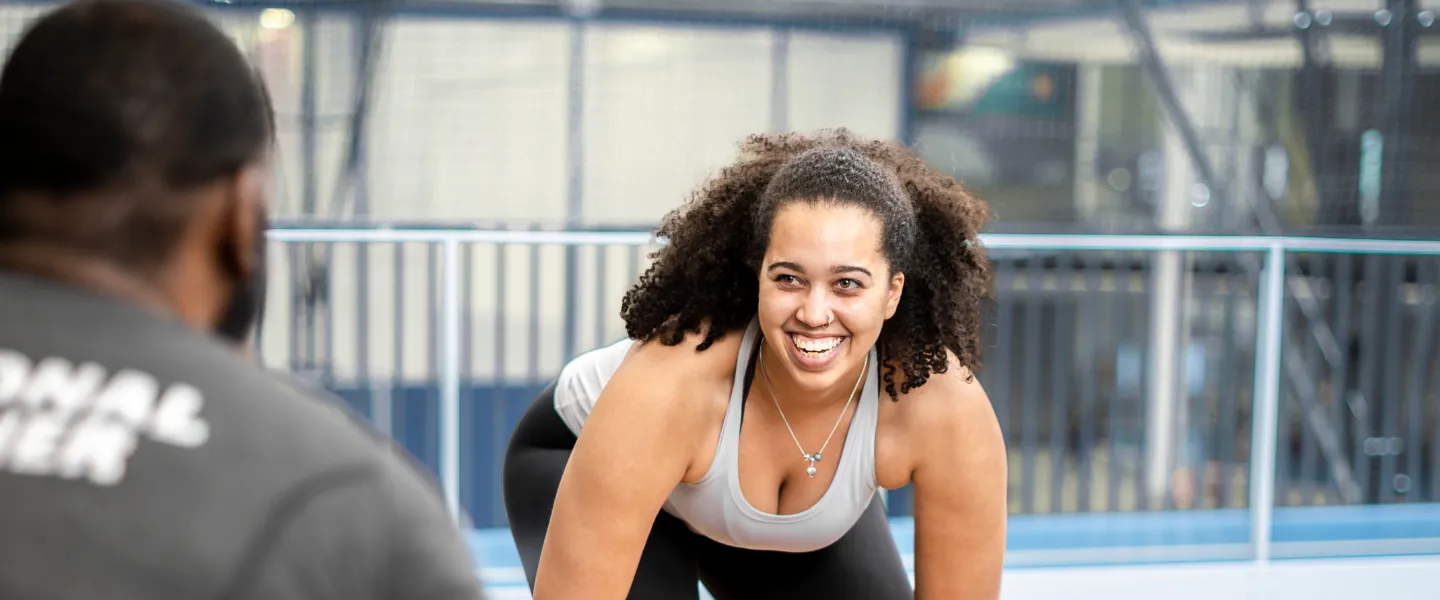 Personal trainer working with someone