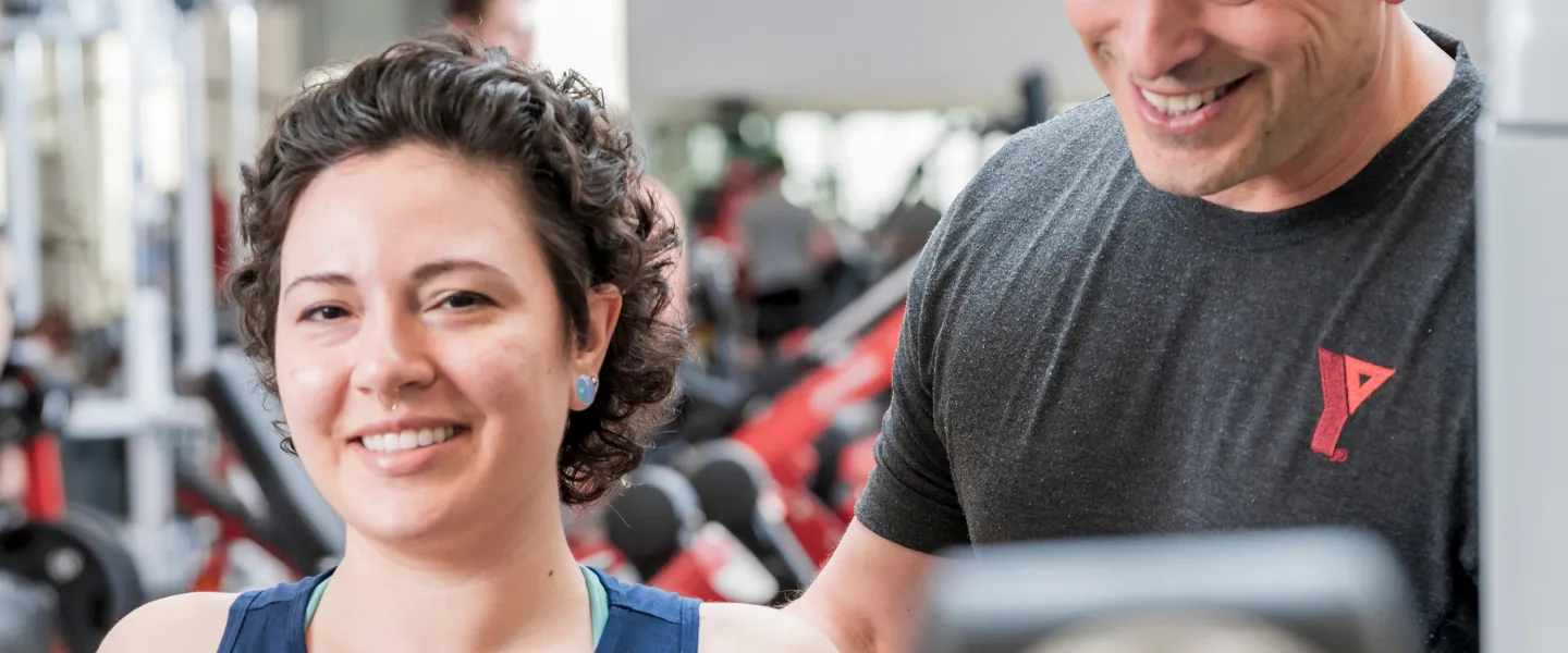 Lady being trained by a Y team member