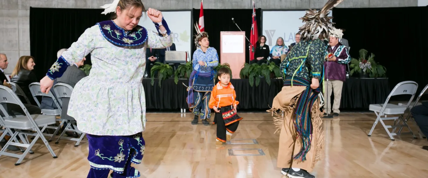 Indigenous dancers dancing at Laurier Brantford YMCA opening celebration