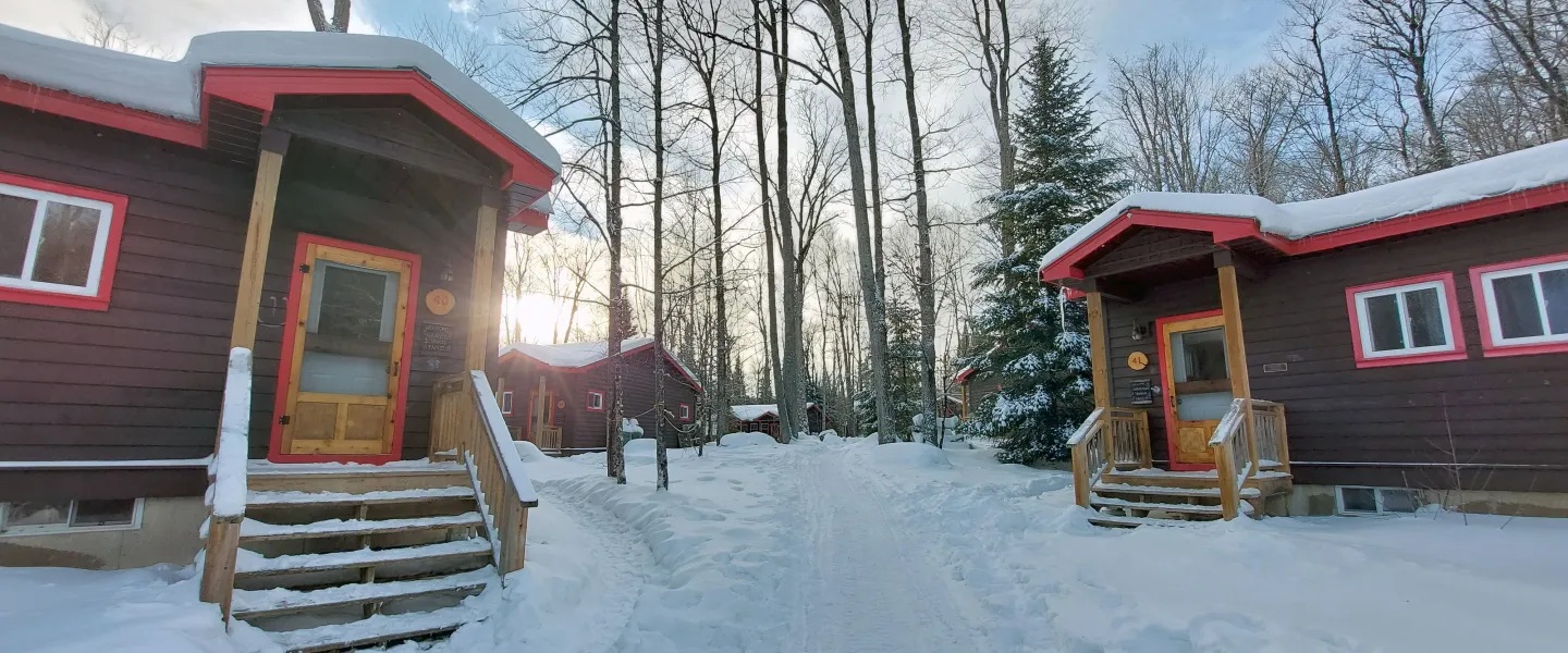 Winterized Cabins in the snow at YMCA Wanakita