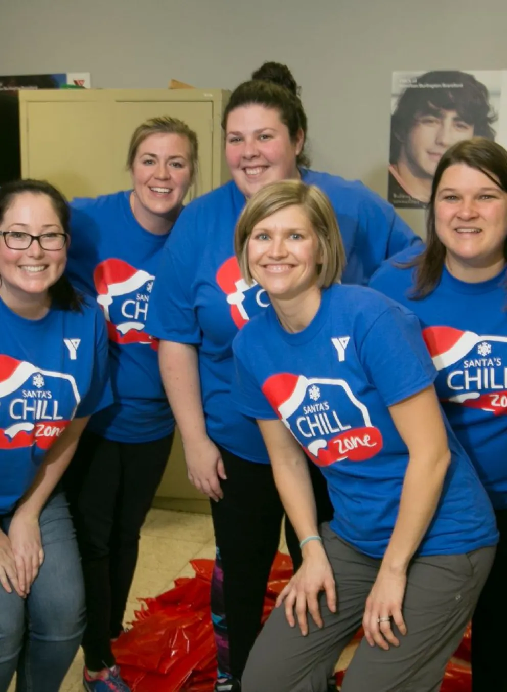 Group of volunteers wearing blue Chill Zone shirts