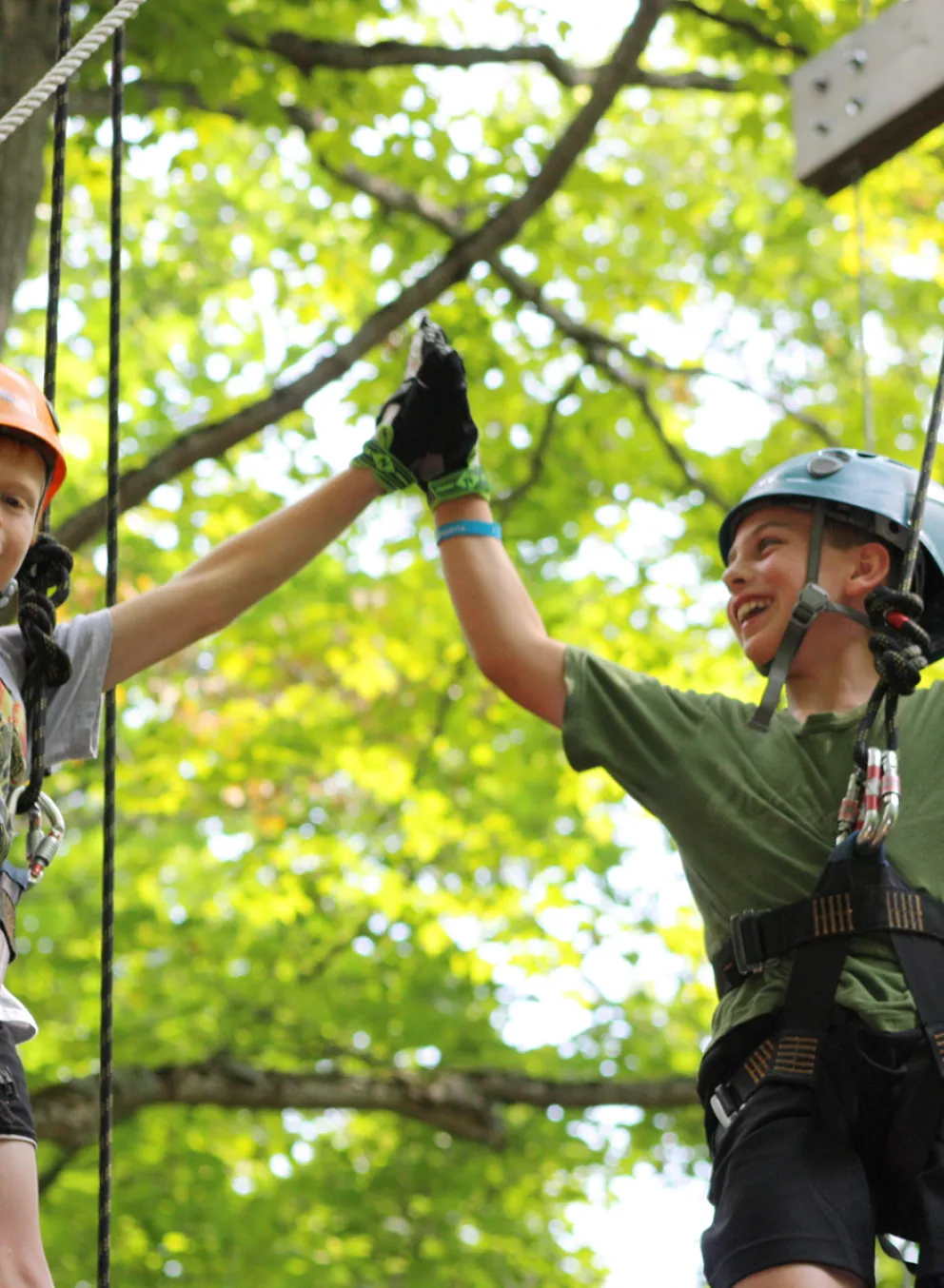 Father and son on high ropes