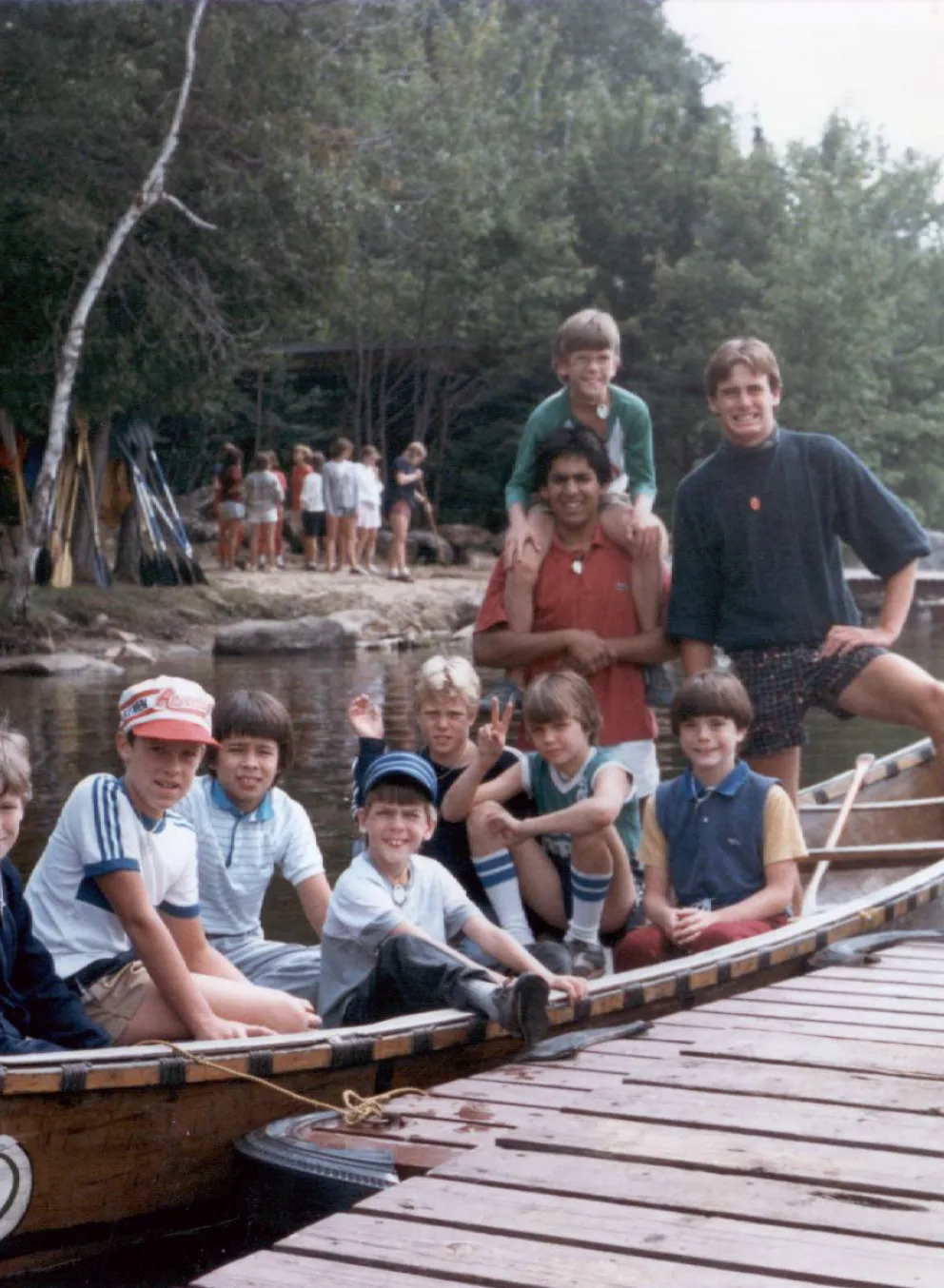 Campers sitting in voyageur canoe