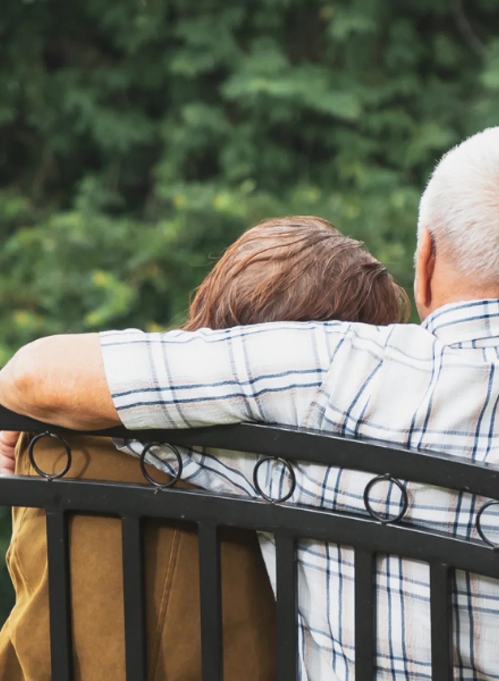 Elderly couple on bench
