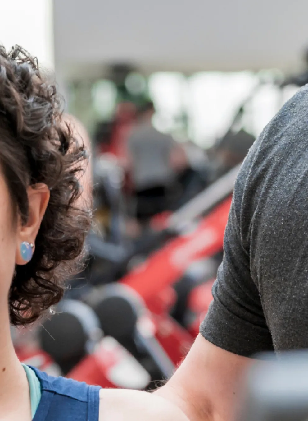 Lady being trained by a Y team member