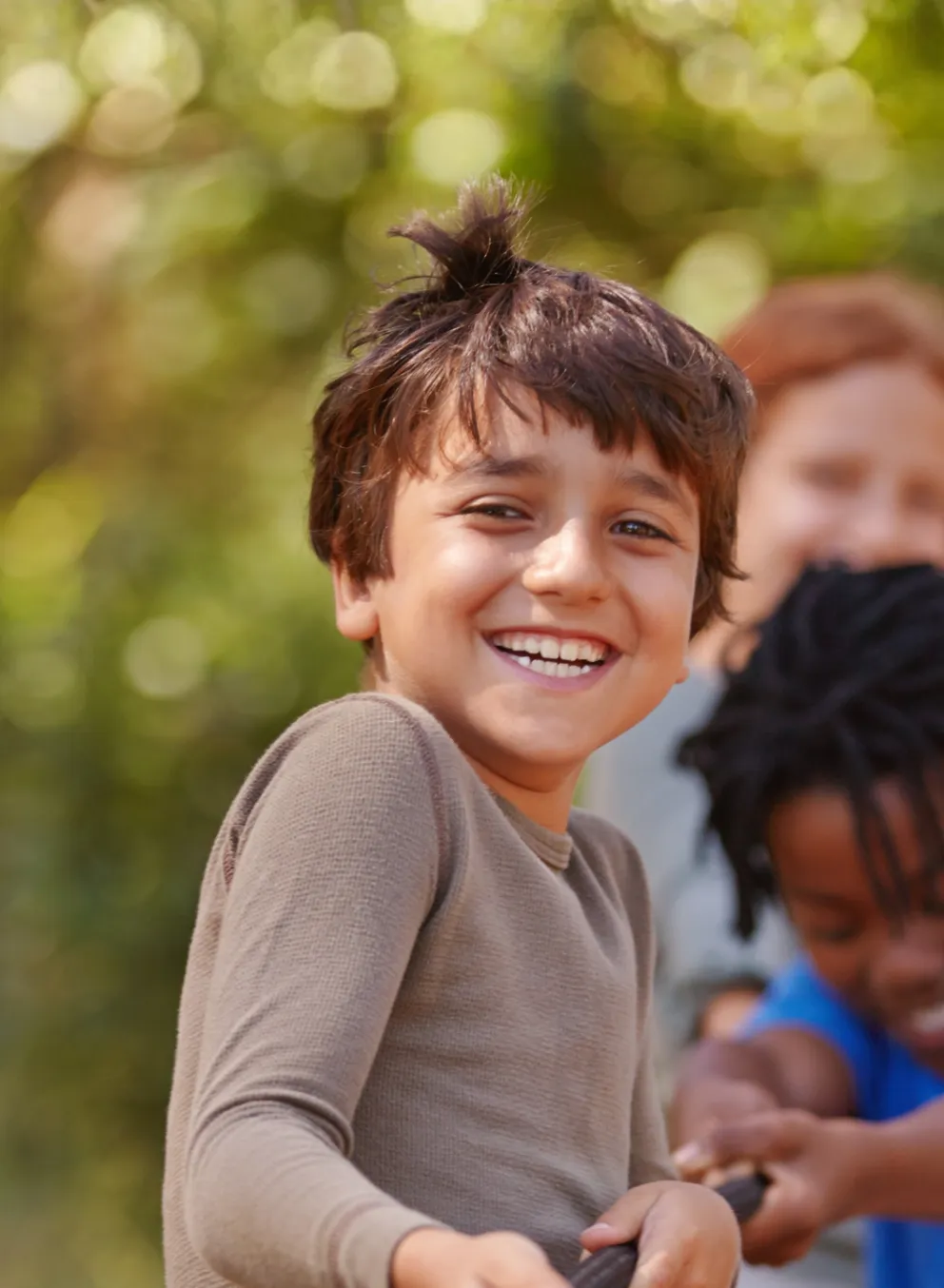 KIds having a tug of war