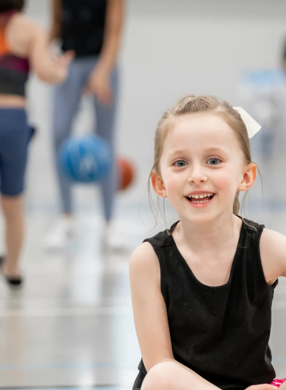 Girl in Gym smiling