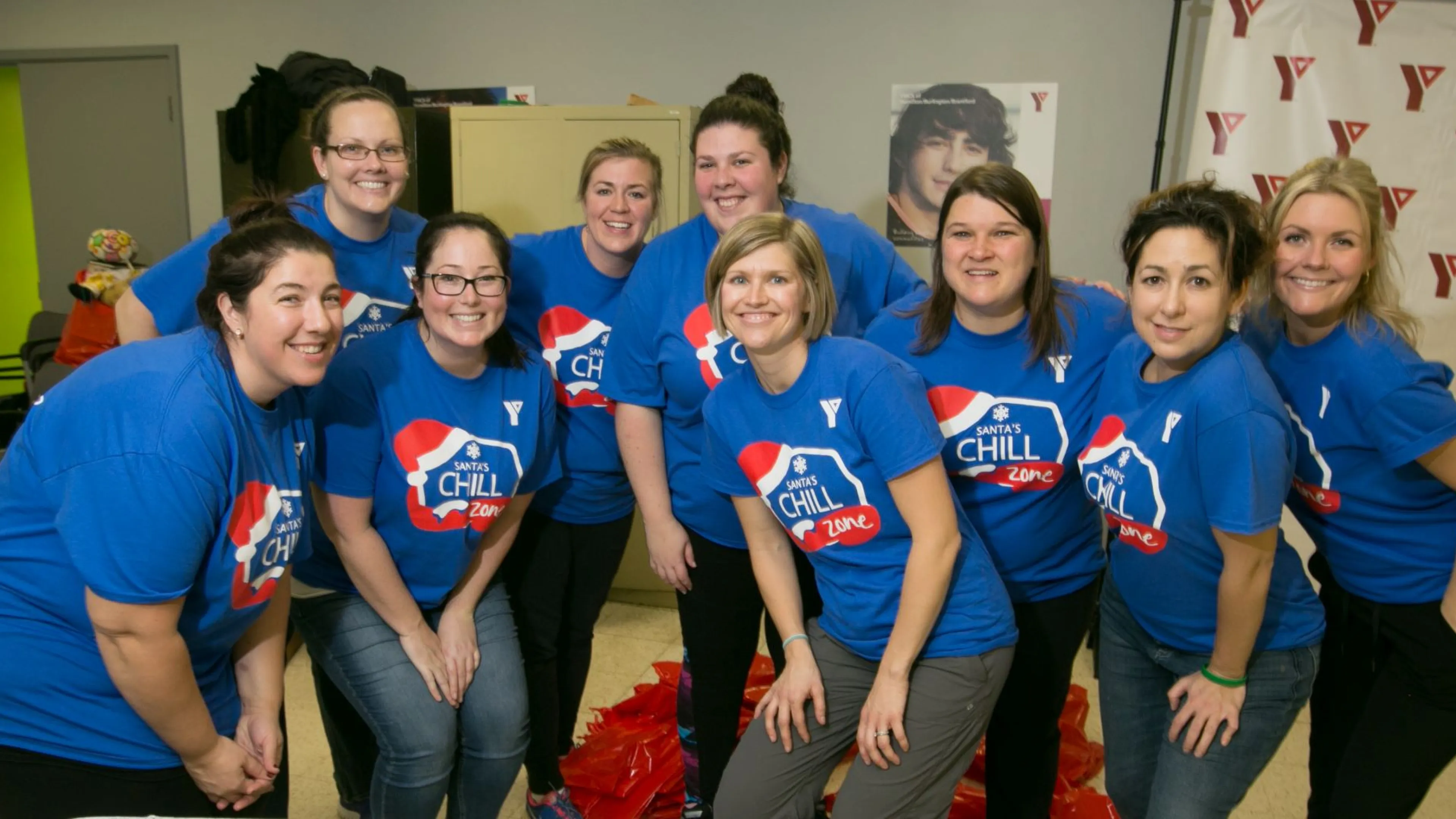 Group of volunteers wearing blue Chill Zone shirts