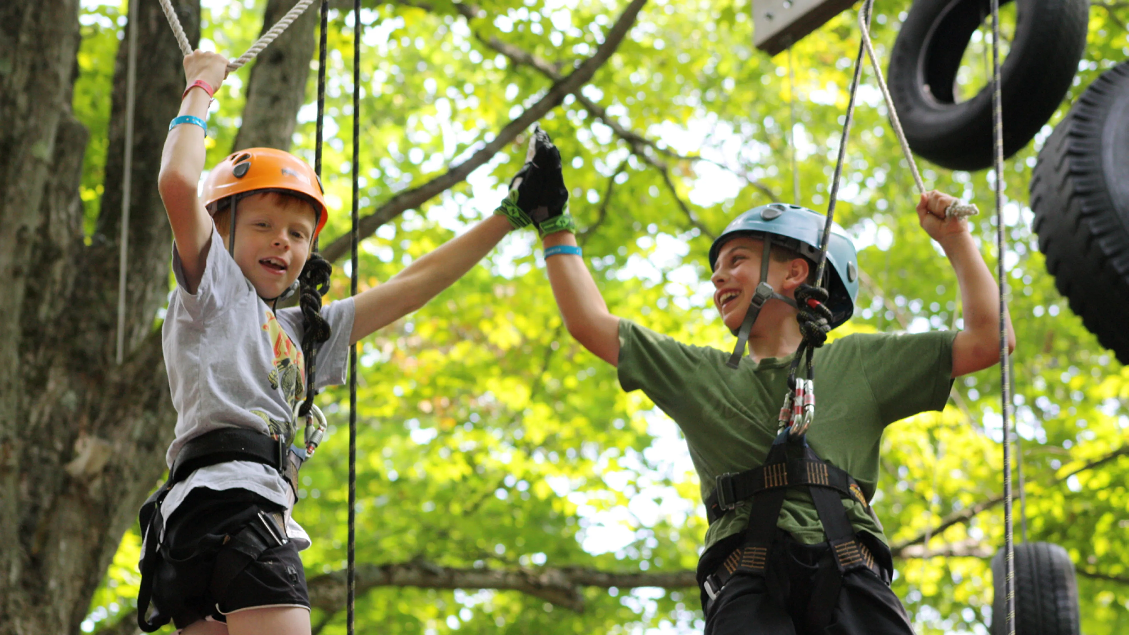Father and son on high ropes