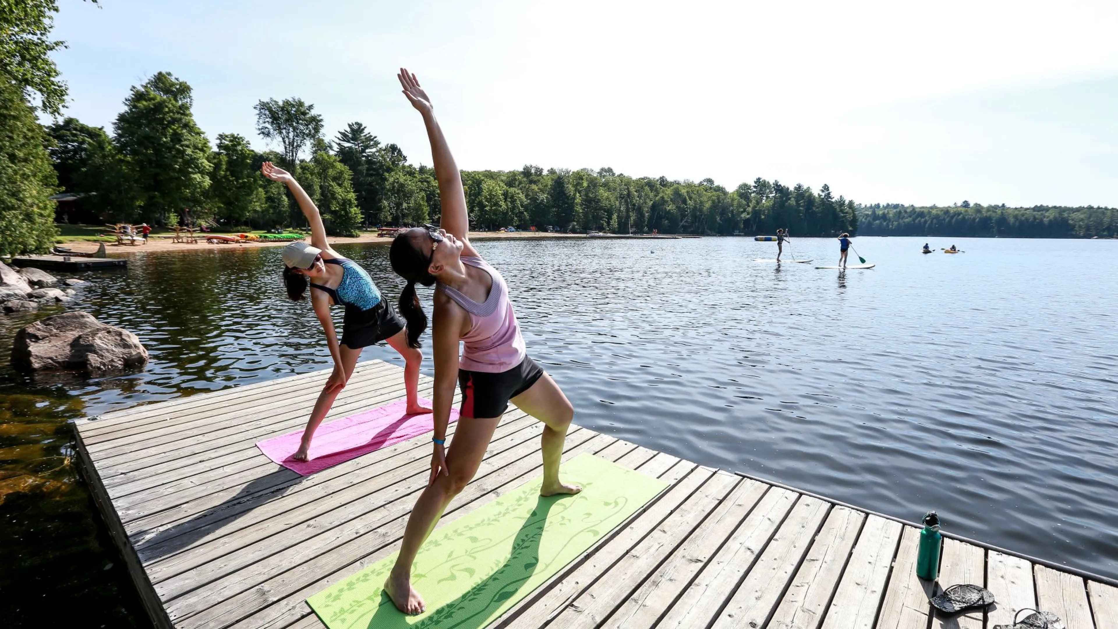 People Stretching on Dock at YMCA Wanakita
