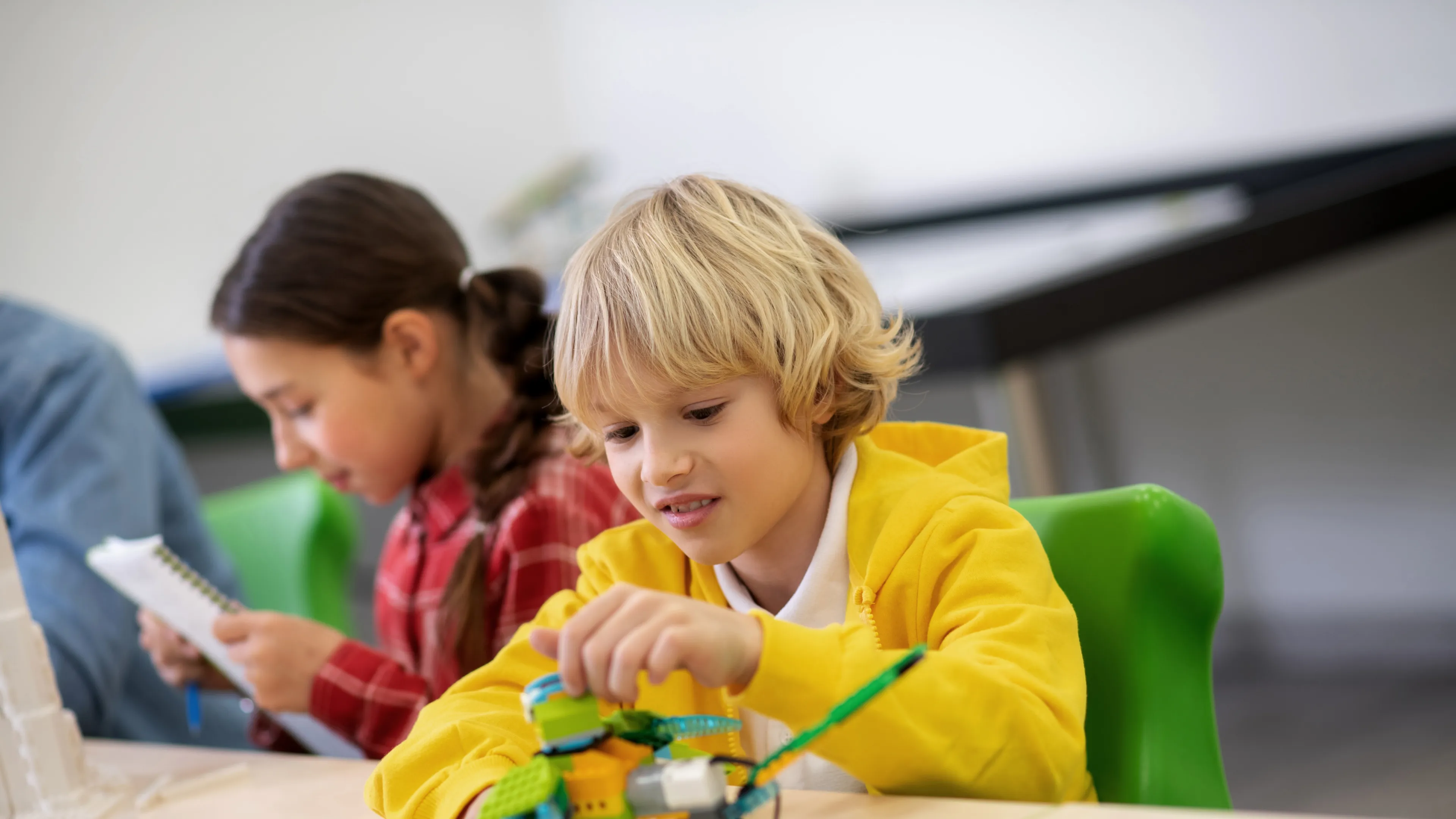 Male child building a toy structure