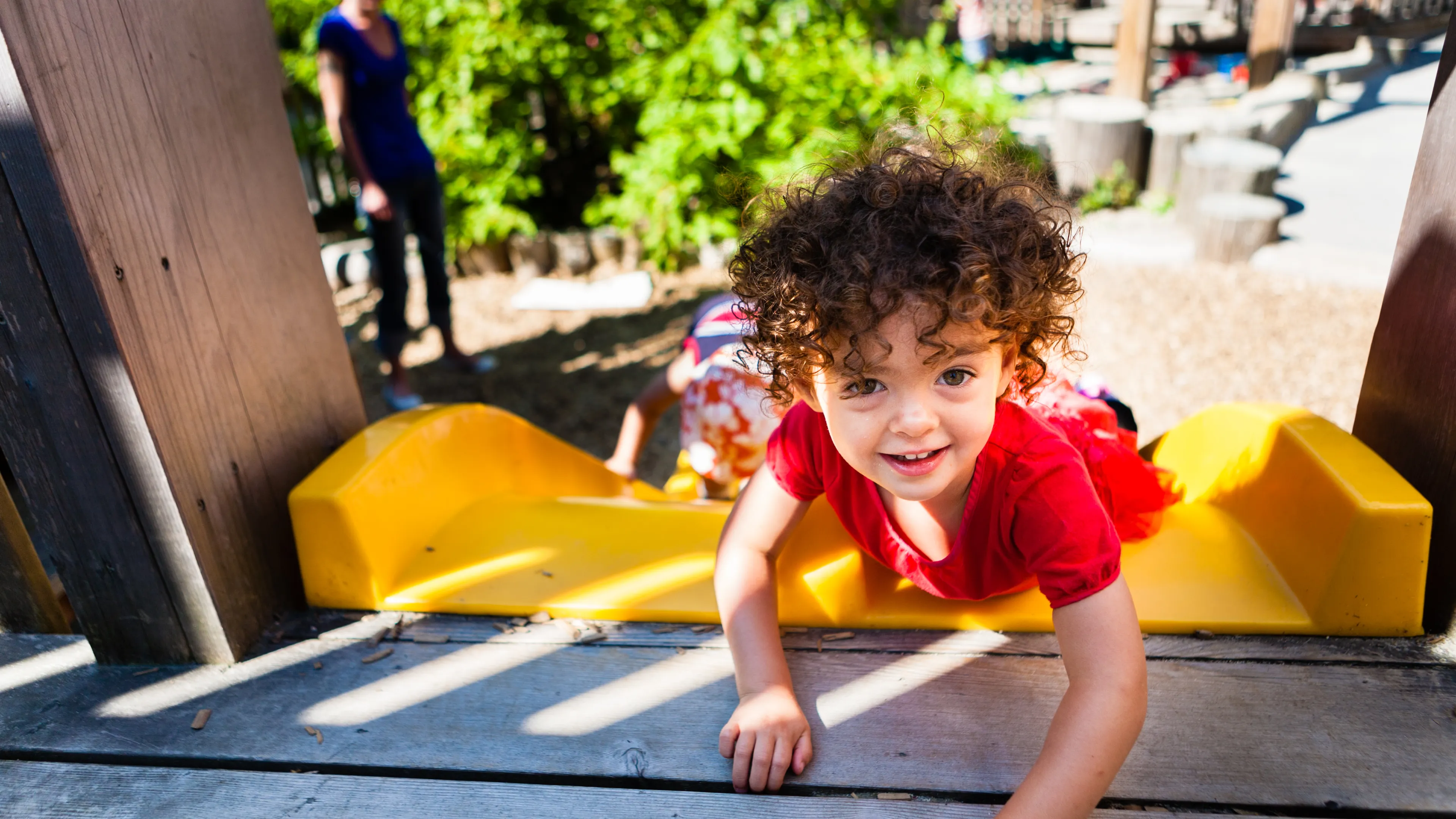child-on-slide