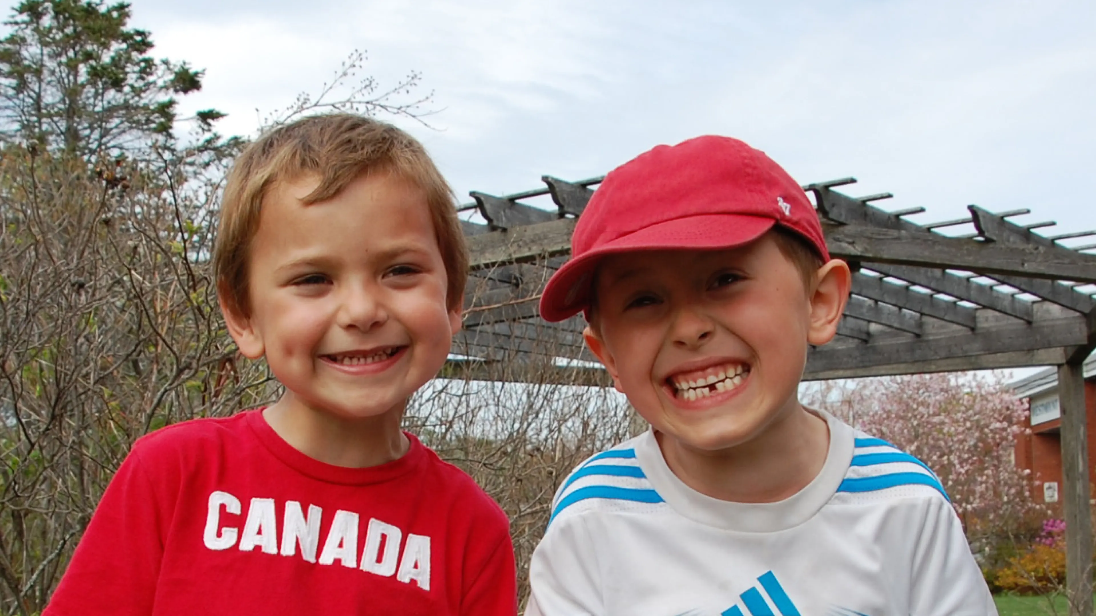 Boys smiling into camera