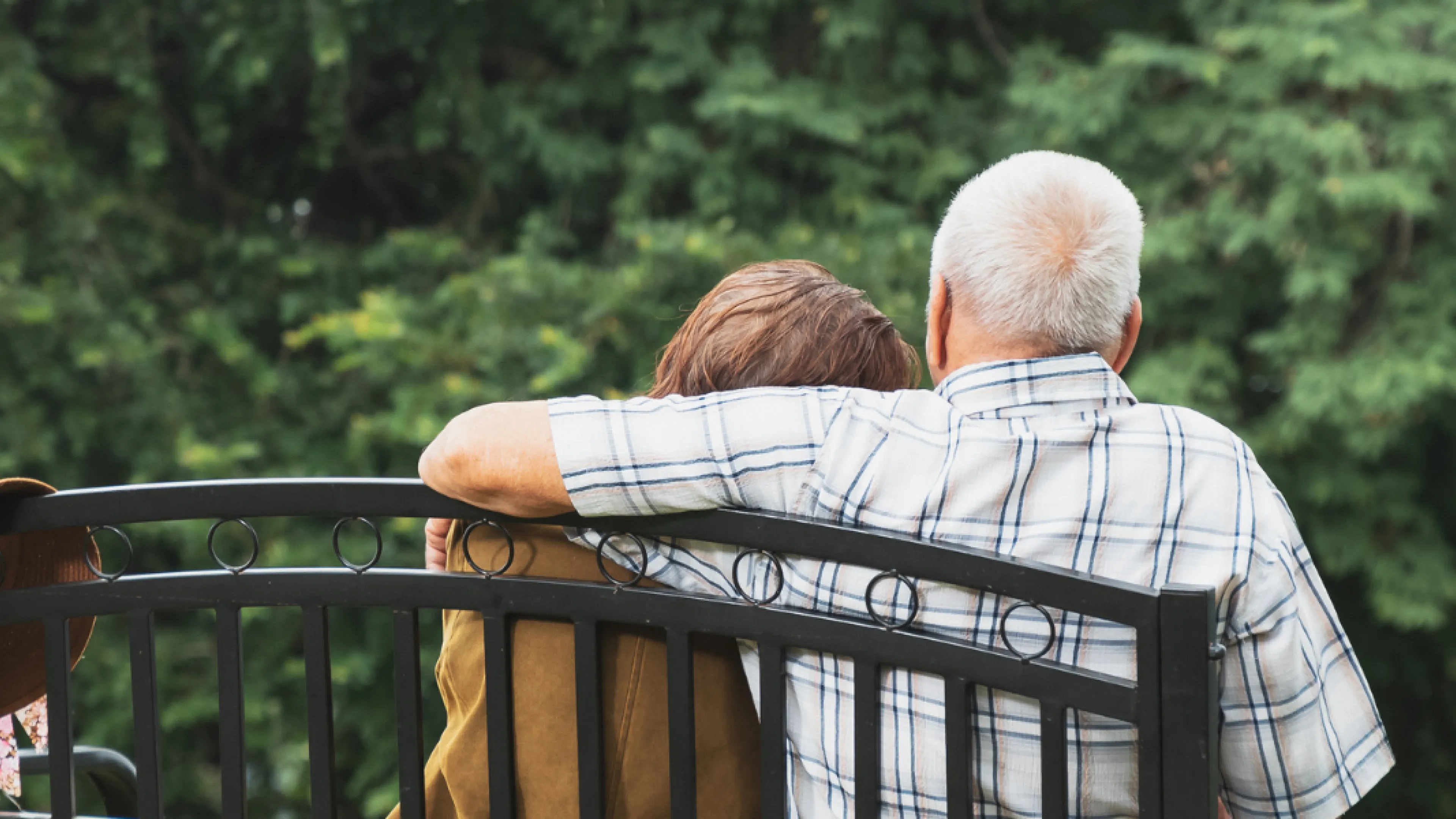 Elderly couple on bench