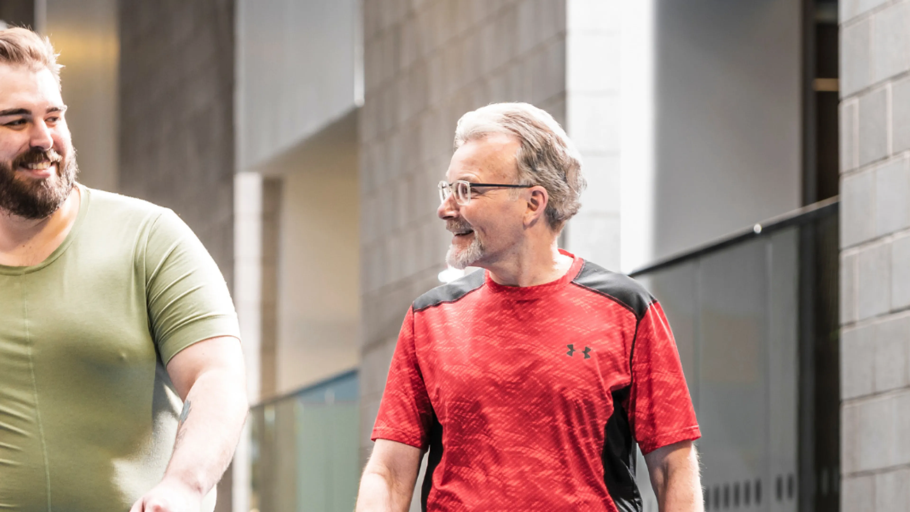Group of three walking around smiling