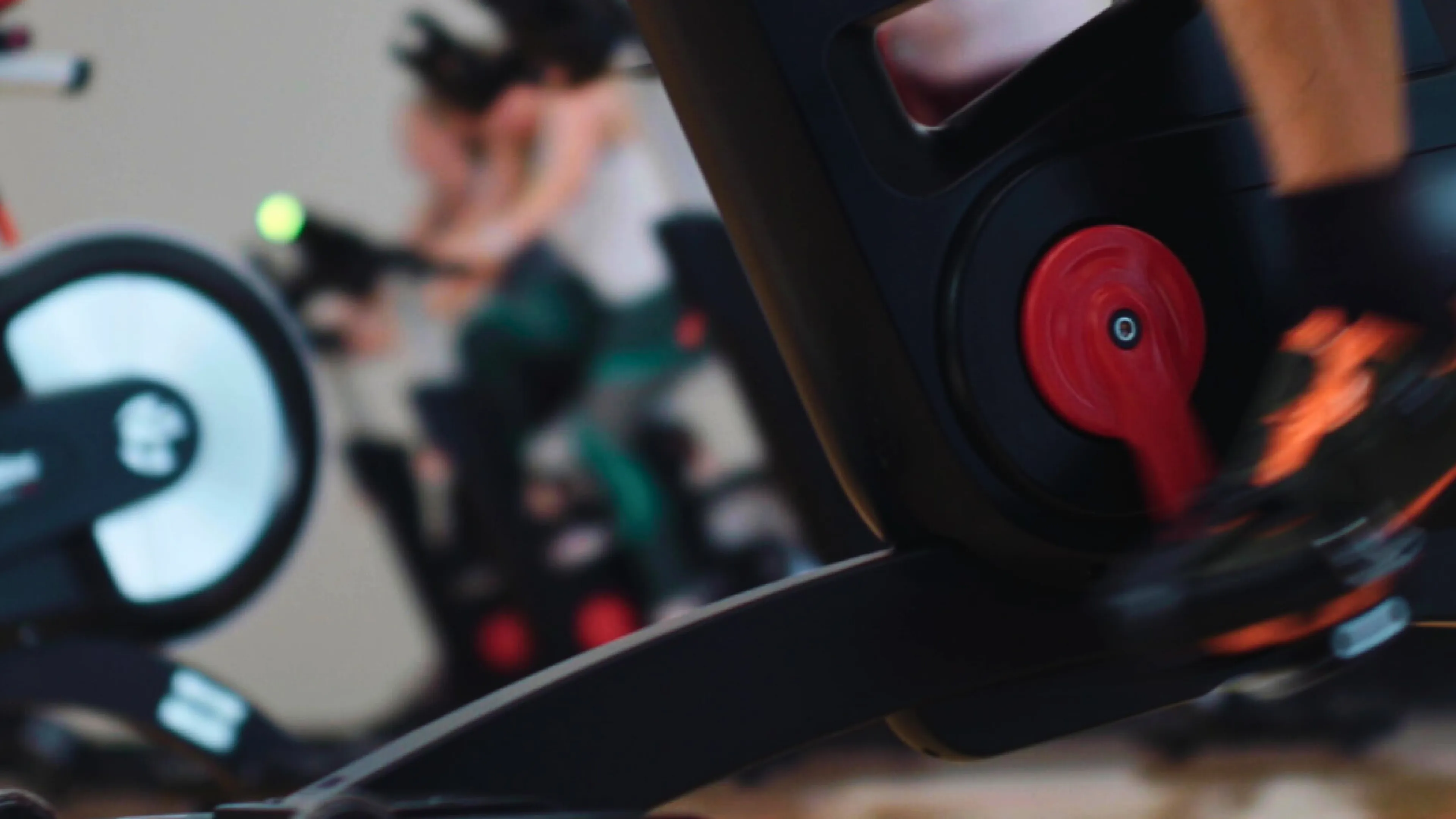 Group ridng on bikes at gym