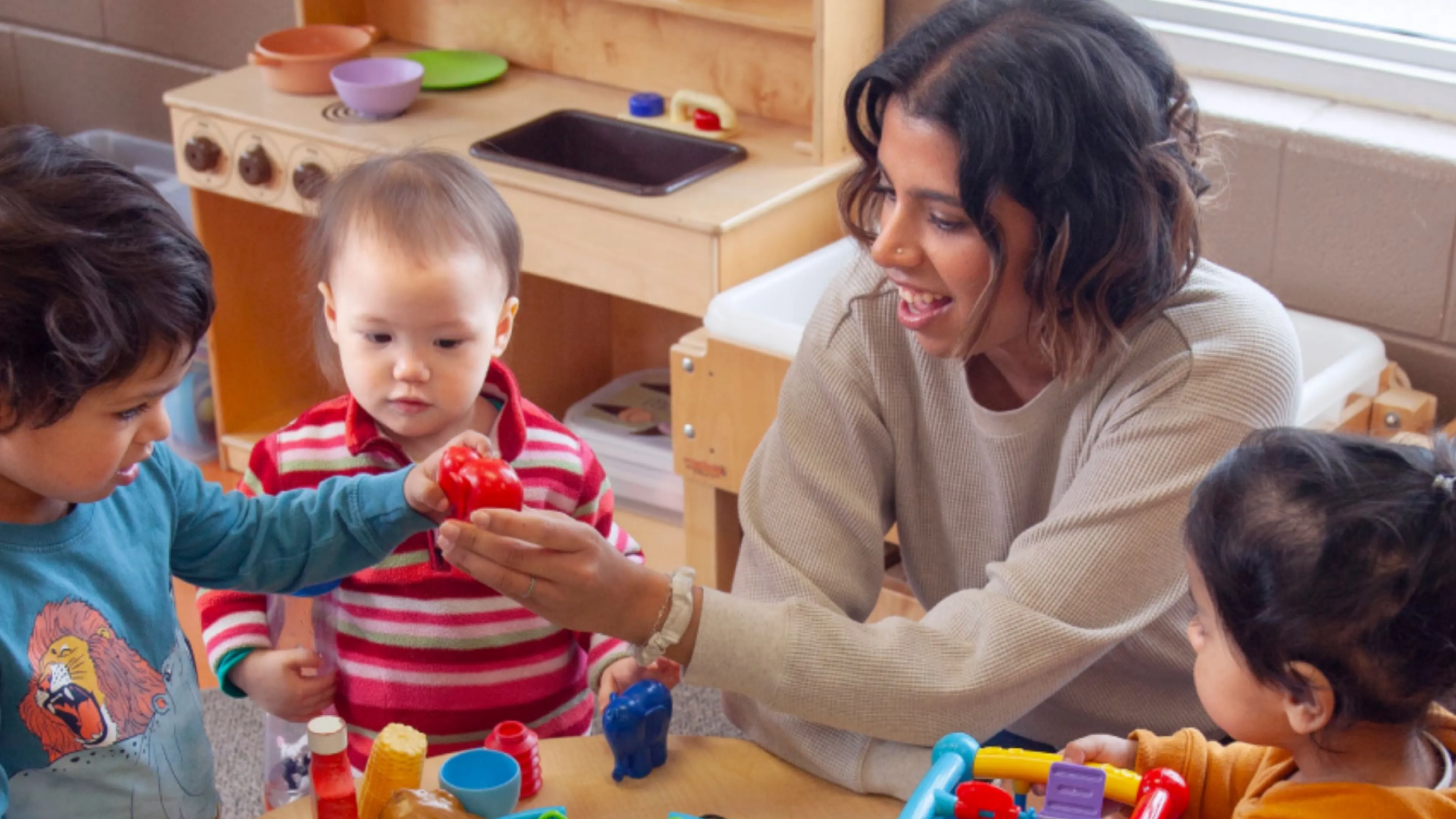 Woman with kids in a child care setting