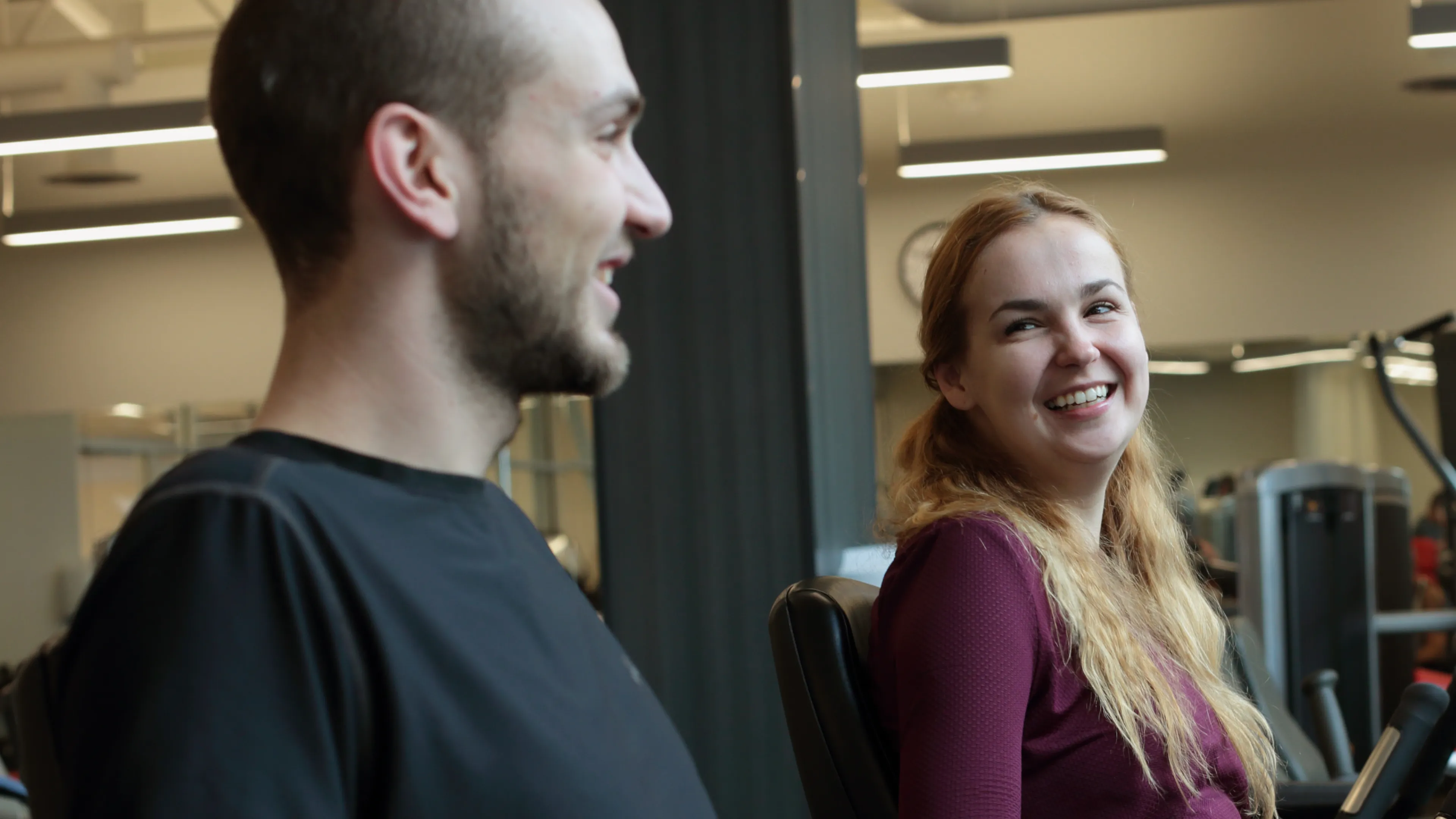 Girl and Guy in a Gym