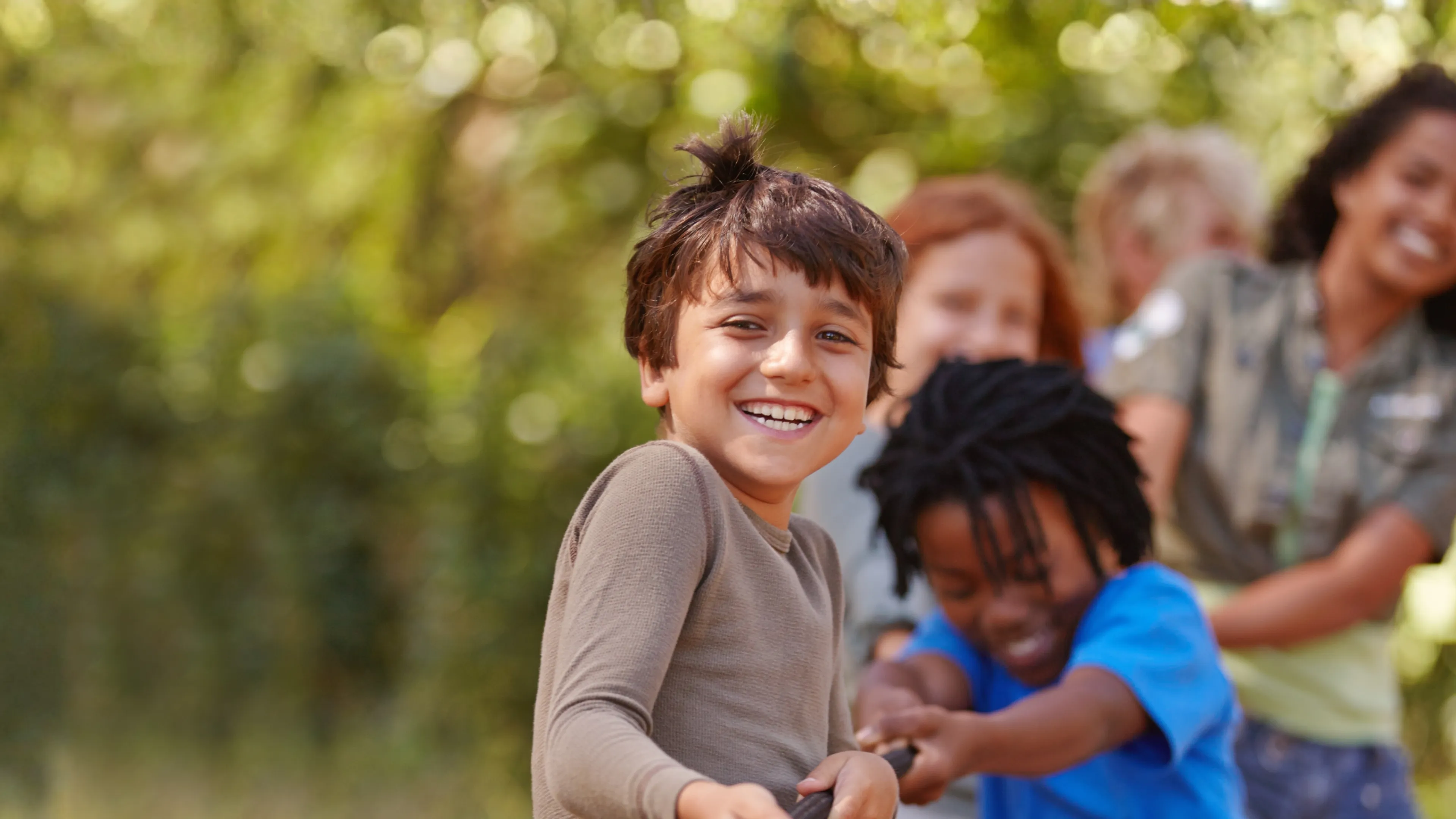 KIds having a tug of war