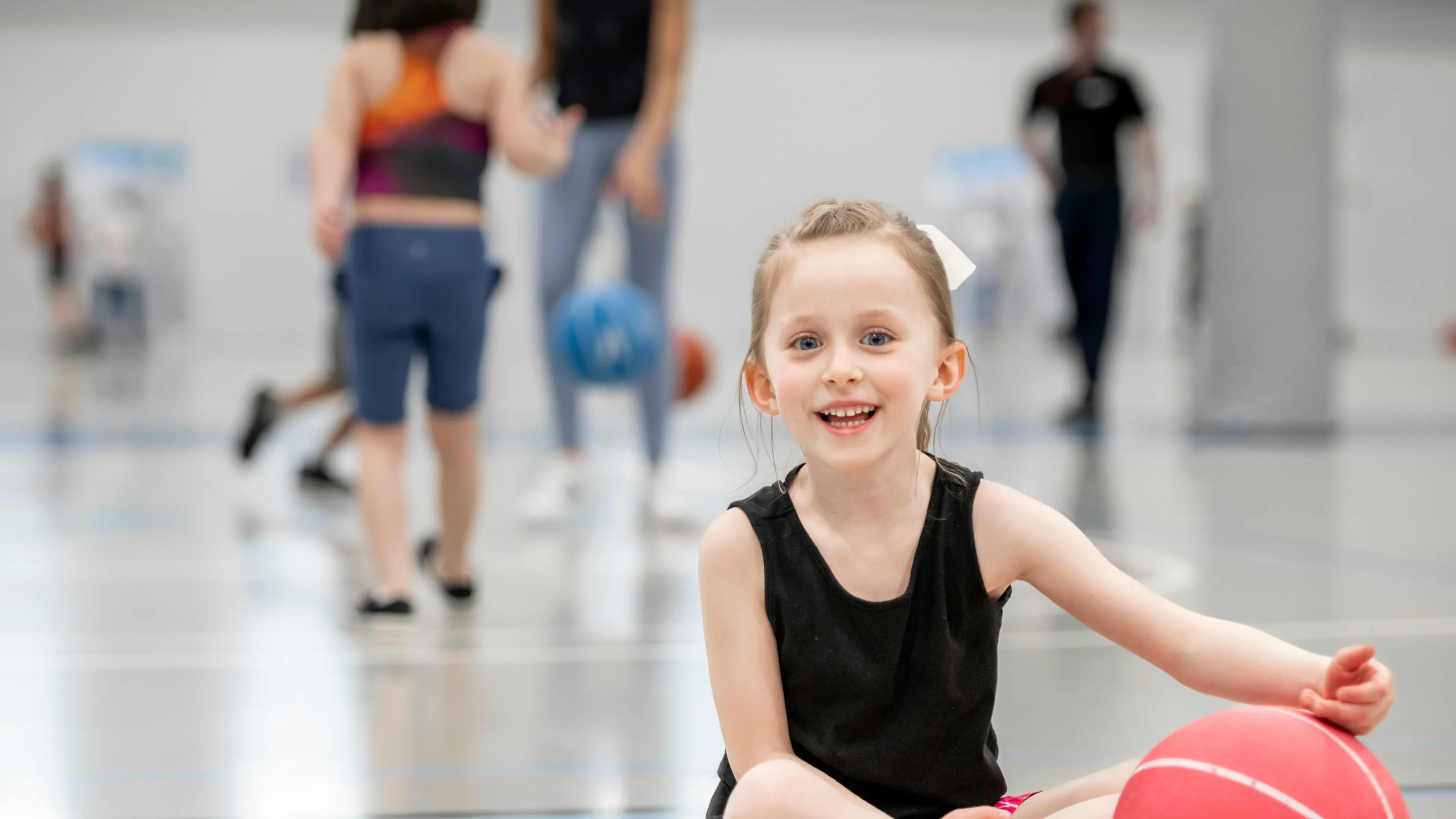 Girl in Gym smiling