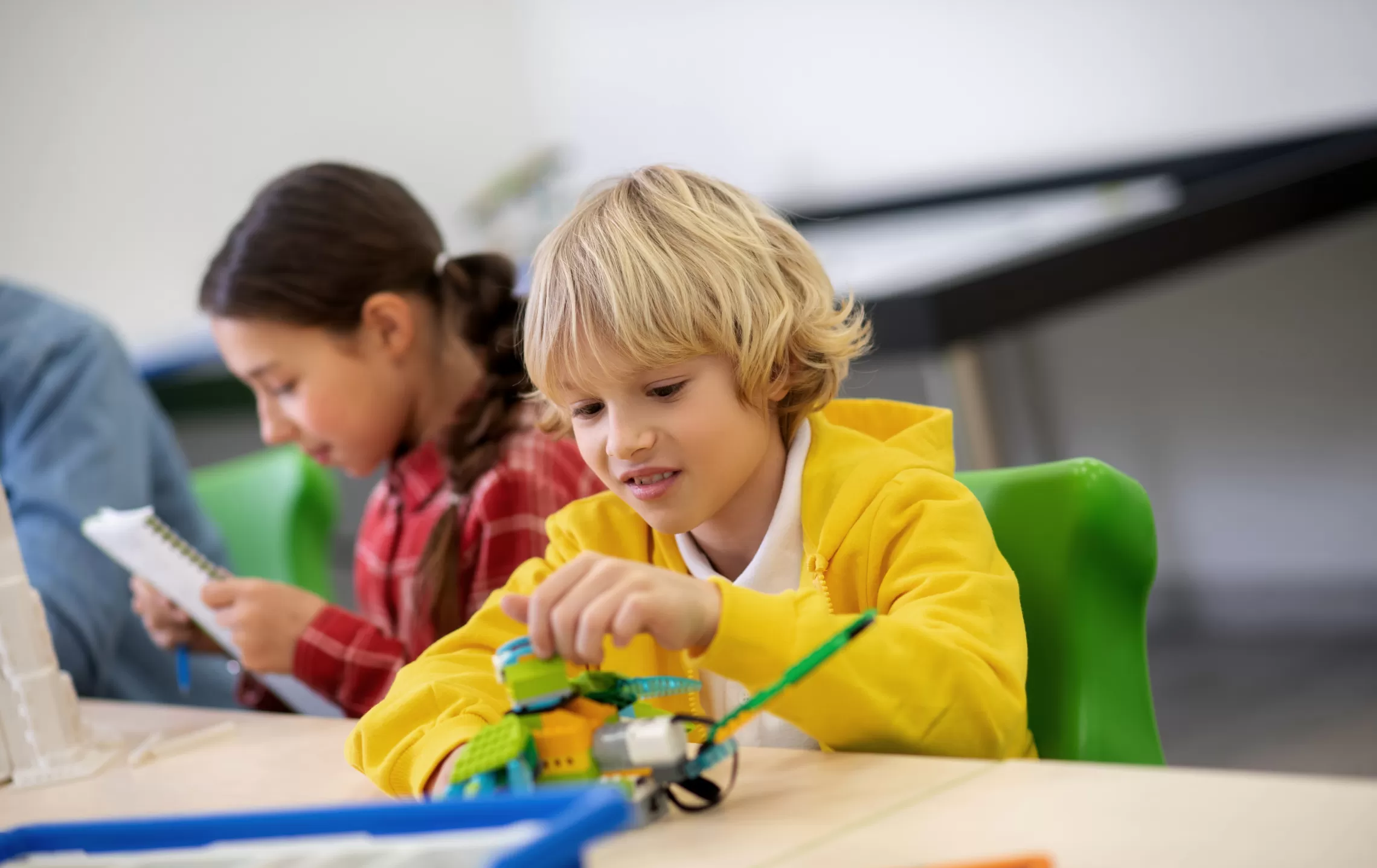 Male child building a toy structure
