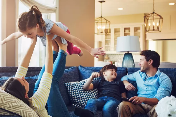 A family laughing and smiling