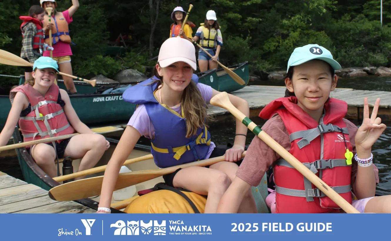 3 girls in a canoe