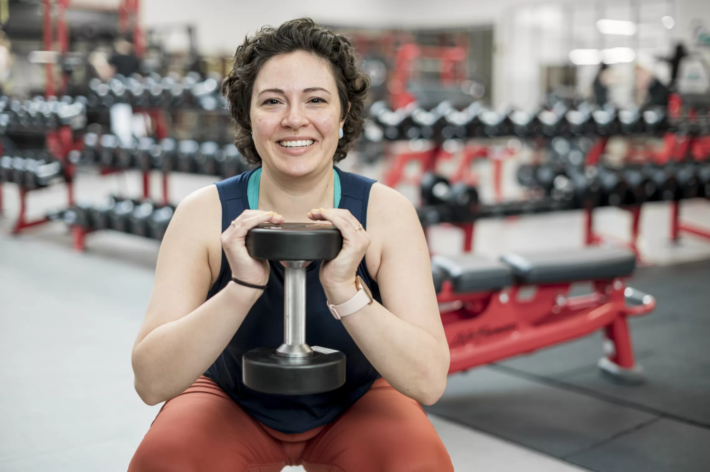 Woman working out with a dumbell