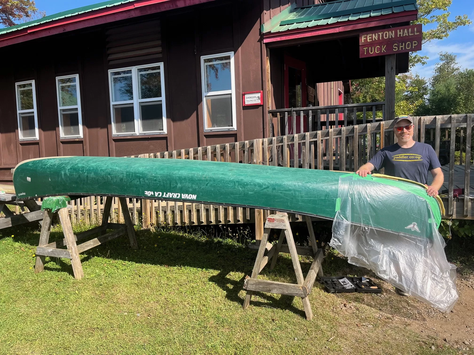 Keith repairing canoe