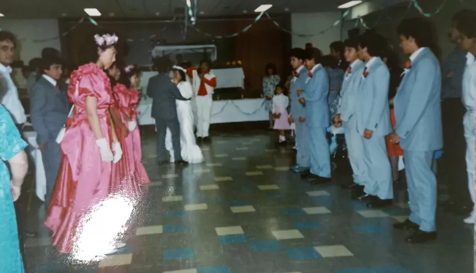 Couple dances at wedding in basement of Downtown YMCA