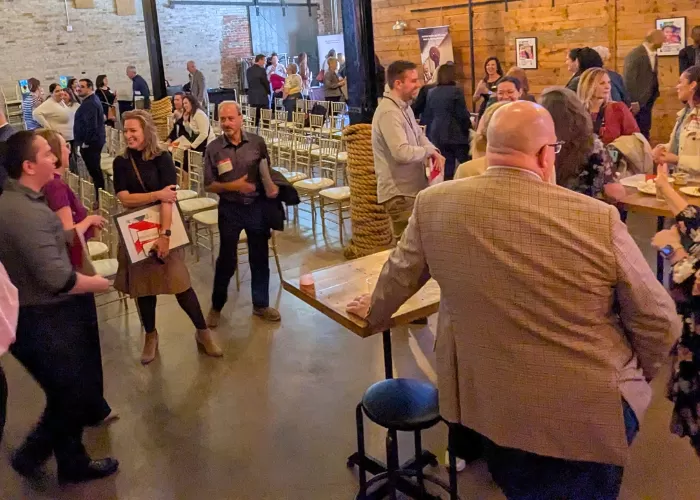 Group of people mingling at an event
