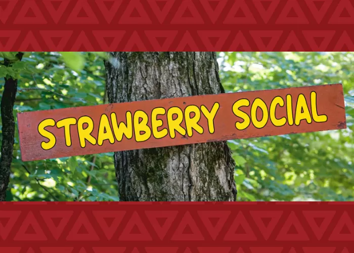 Strawberry Social sign on a tree
