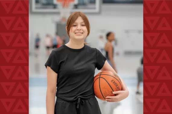 Young lady holding a basketball