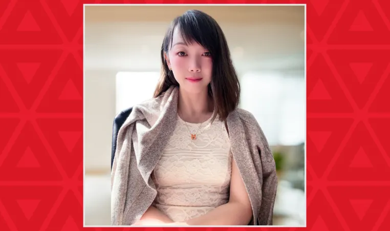 Young women with slight smile in office chair