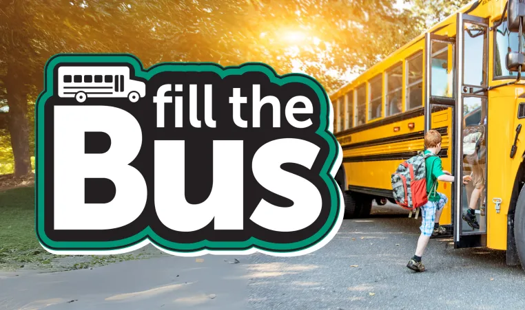 Fill The Bus logo with child getting on bus 