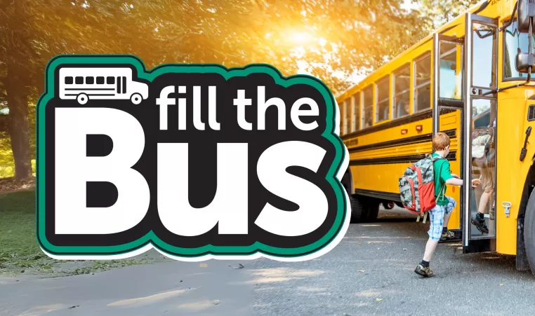 Fill The Bus logo with child getting on bus