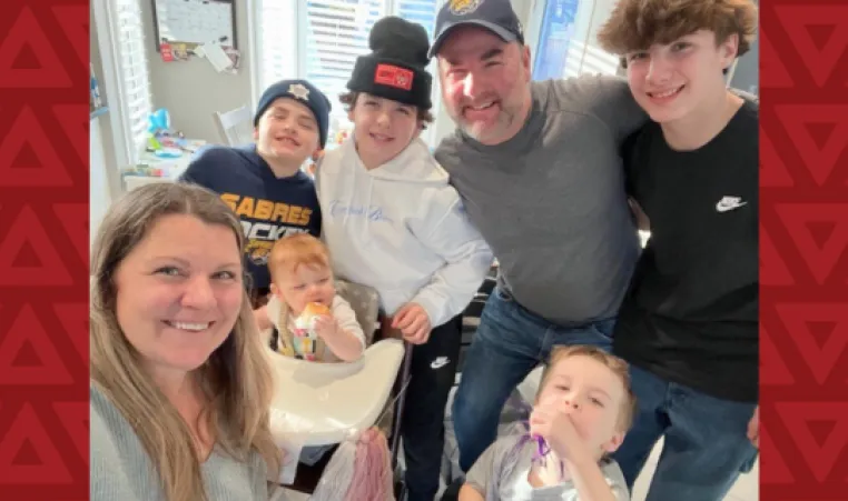 Marthas family smiling at camera